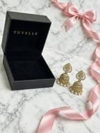 Close-up of Mehr jhumka earrings showing teardrop tops and pearl-look bead fringes